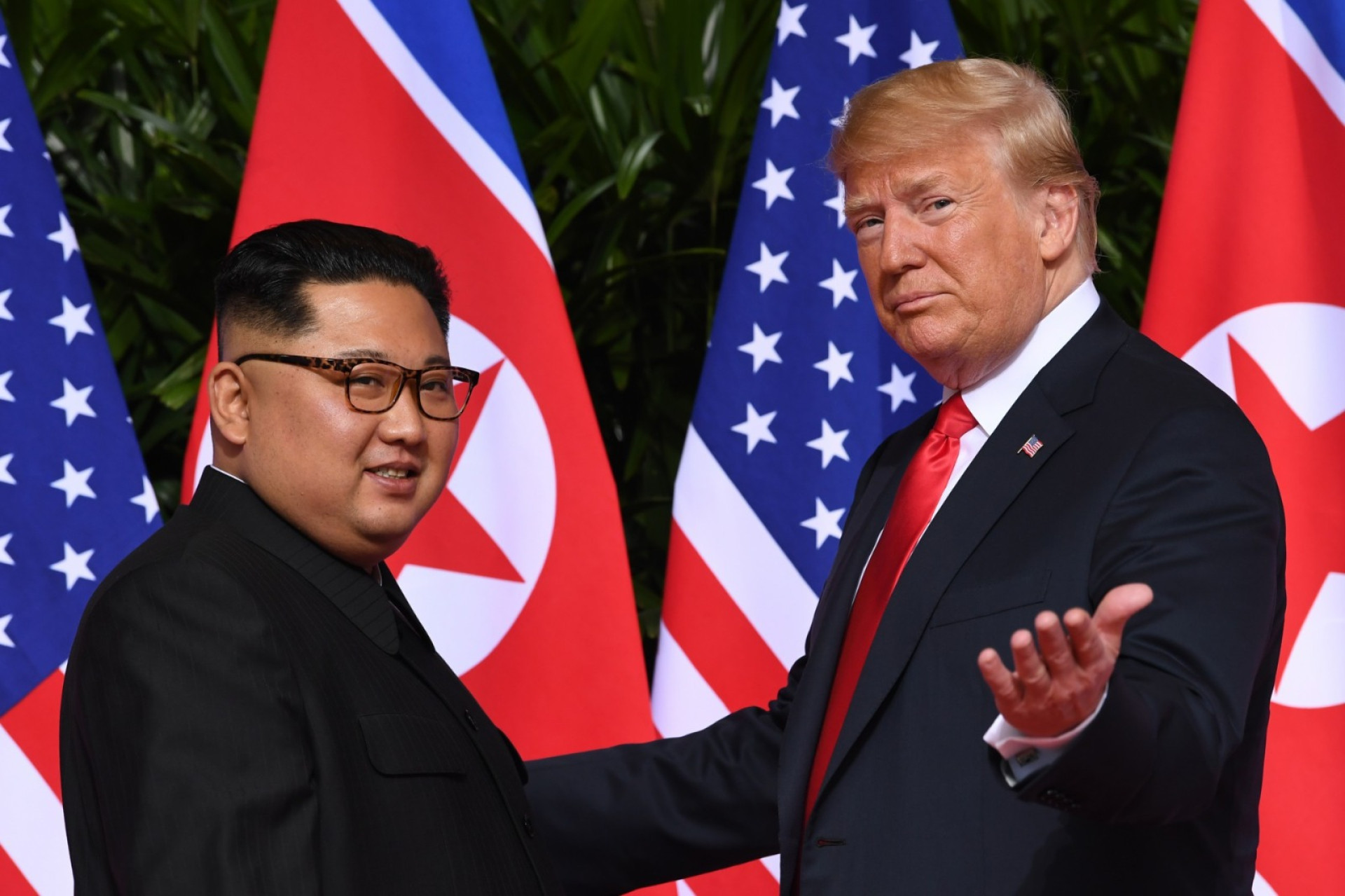 Kim Jong-Un e Donald Trump (Foto: Saul Loeb / AFP)