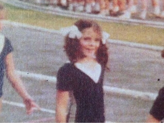 Mylla Christie Vitta Sartori, nascida em 10 de junho de 1971 em São Paulo, se formou em balé clássico, moderno e sapateado e, aos dez anos, foi campeã estadual paulista de ginástica olímpica pelo clube Clube Pinheiros.  
