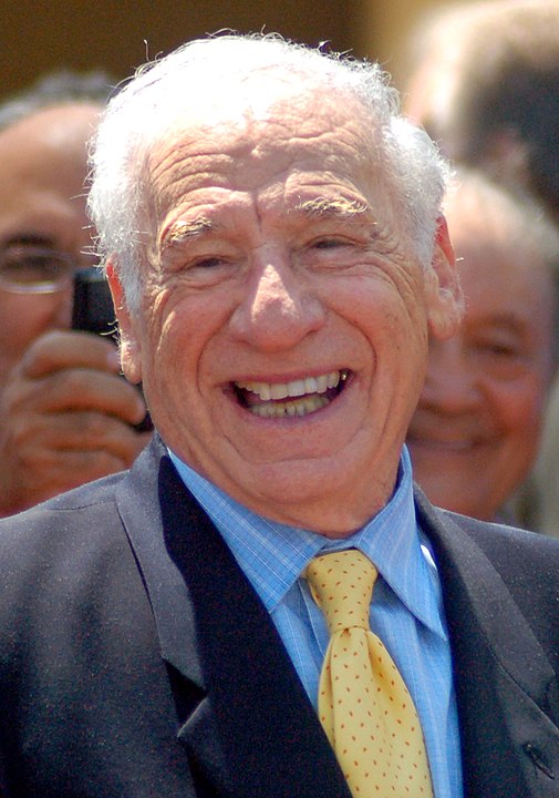 <p>Mel Brooks – Nasceu em 28/6/1926 em Nova York (Estados Unidos). Ator, cineasta e músico. Um dos poucos artistas a receber os quatro maiores prêmios: Oscar (cinema), Grammy (música), Emmy (TV) e Tony (teatro). </p>
