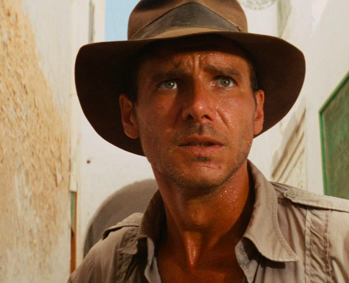 Os Caçadores da Arca Perdida (1981) - Dirigido por Steven Spielberg, estrelado por Harrison Ford e Karen Allen, acompanha Indiana Jones em busca da Arca da Aliança. O tema aventureiro é uma de suas trilhas mais icônicas.